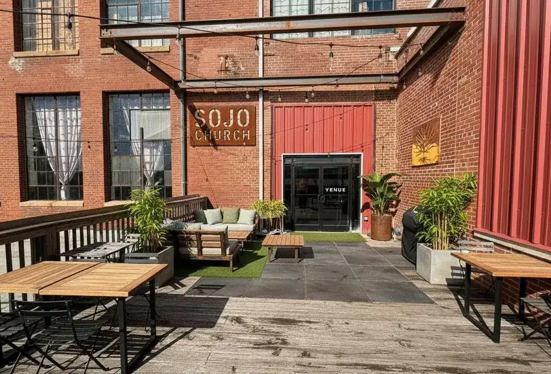 Rendering of the outdoor patio with SOJO Church signage